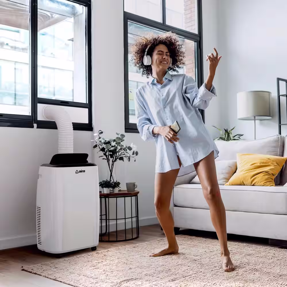 AIRO COMFORT 10,000 BTU 115-Volt Portable Air Conditioner Cools 300 sq. ft. with Dehumidifier Function and LCD Remote White
