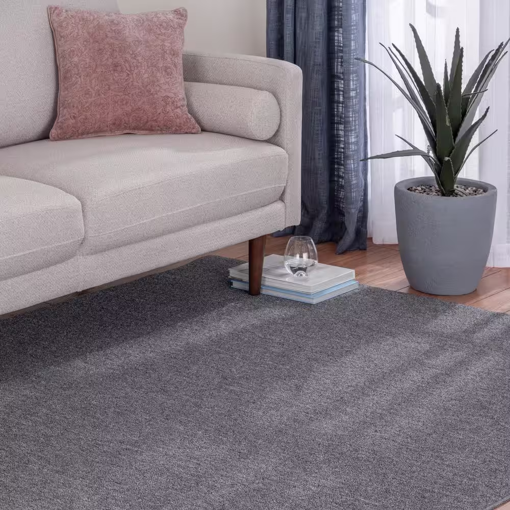 TrafficMaster Heavy Traffic Gray Solid Color 6 ft. x 8 ft. Carpet Remnant Area Rug