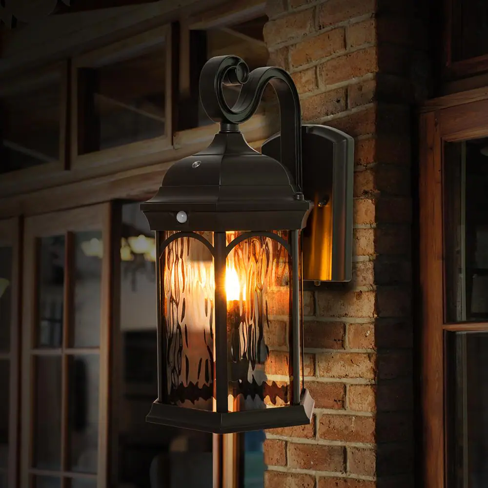 Home Decorators Collection Bronze Integrated LED Motion Sensing Dusk to Dawn Outdoor Wall Lantern Sconce Light with Flickering Bulb/Clear Glass